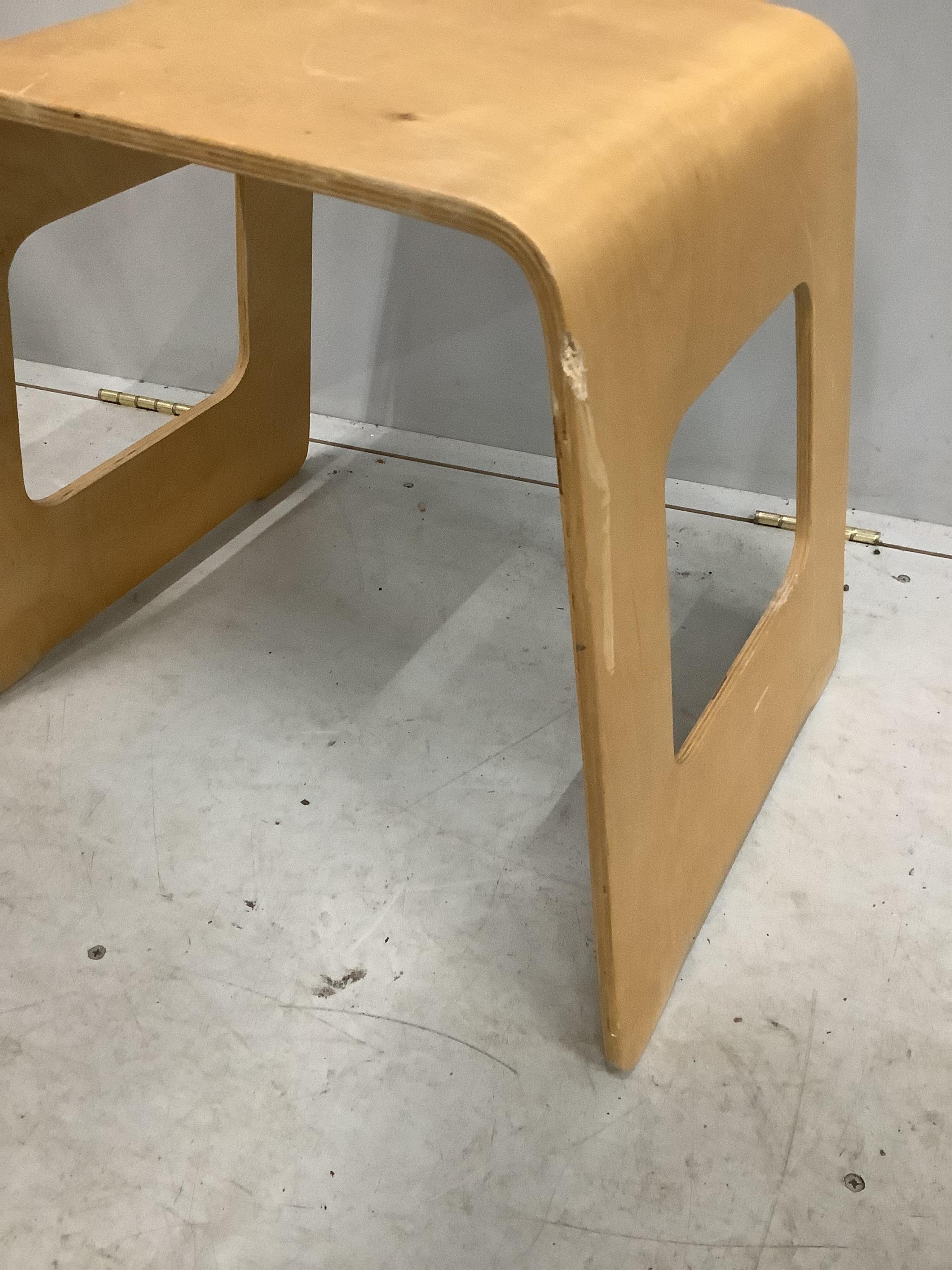 A pair of Swedish wooden stools by USA Norinder for IKEA, c.1990, each width 48cm, depth 35cm, height 44cm. Condition - fair